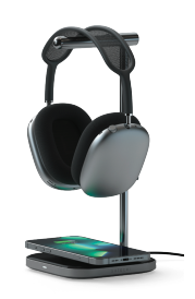Satechi 2-in-1 Headphone Stand with Wireless Charger holding a pair of headphones with a phone charging on the base